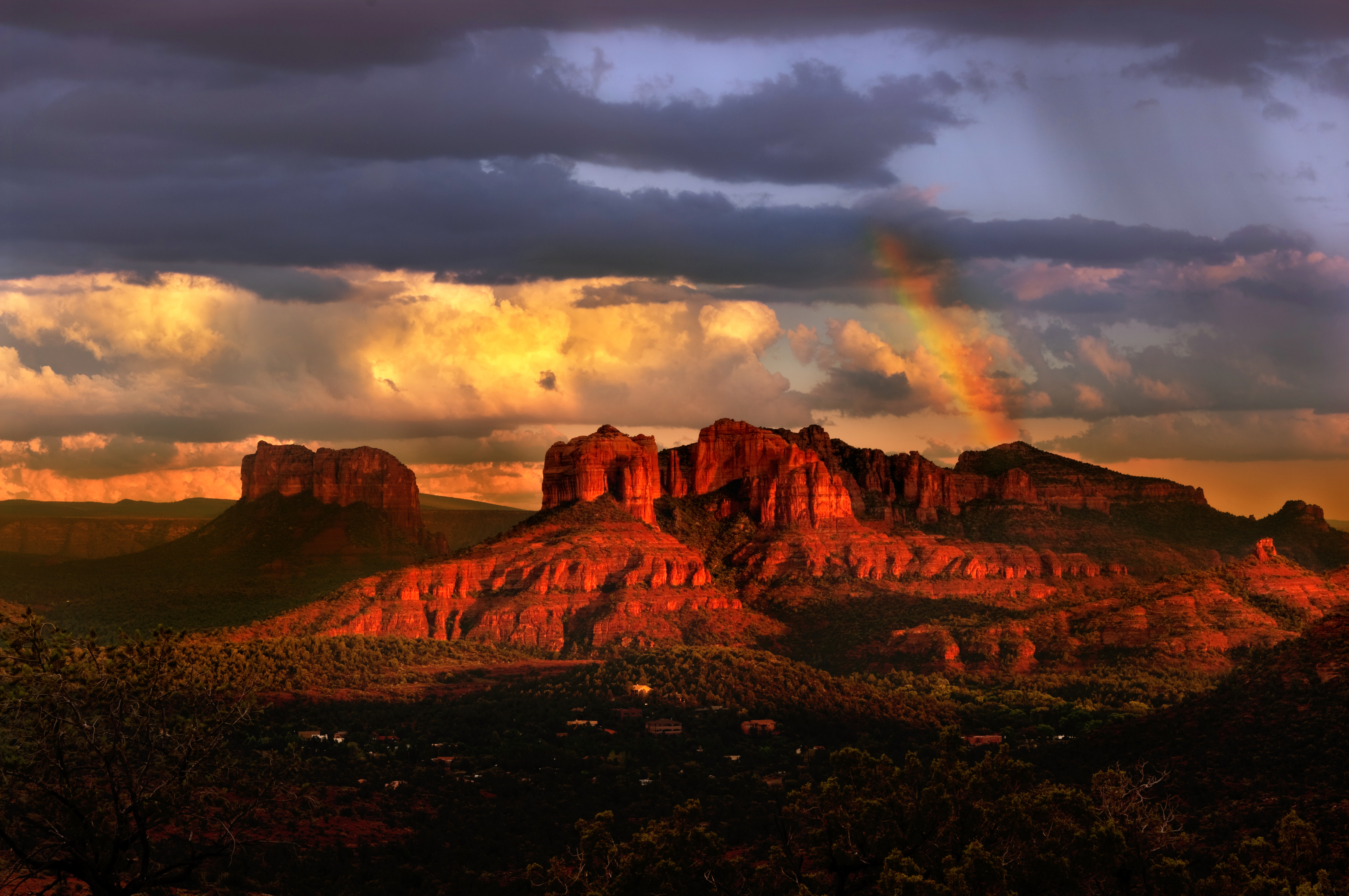 Beautiful red rocks of Sedona at sunset with rainbow.